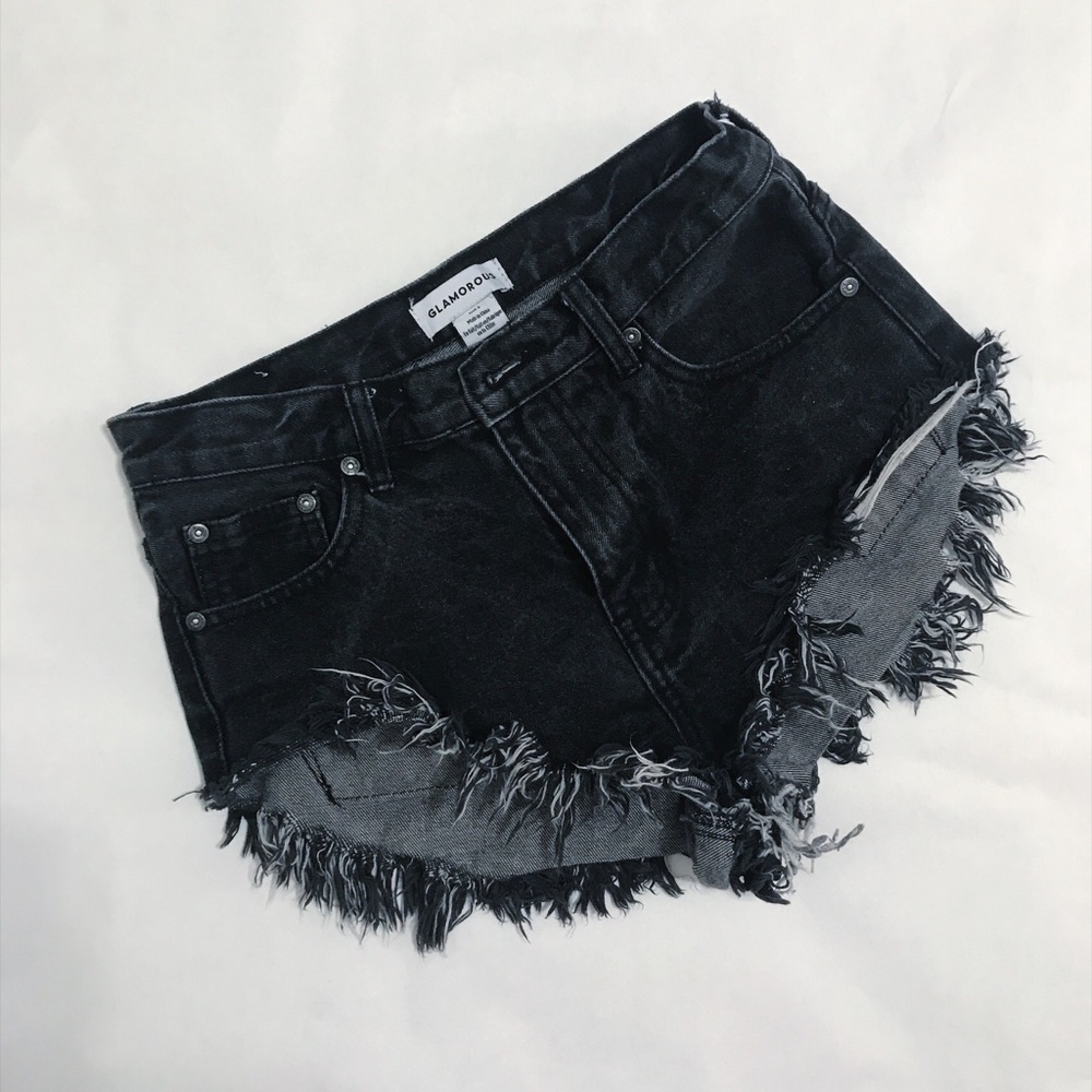 Black denim cutoff shorts.